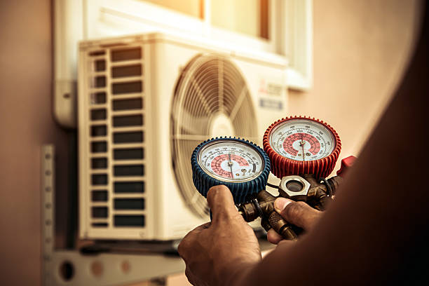 Professional Hvac Maintenance technician working in Springville, TN